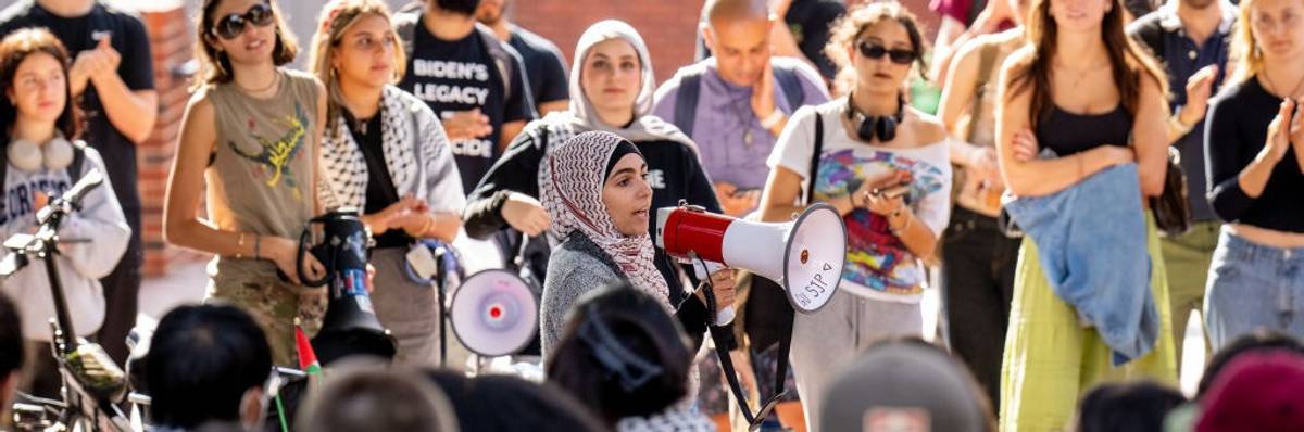 A woman speaks as Georgetown students hold rally opposed to Gaza war