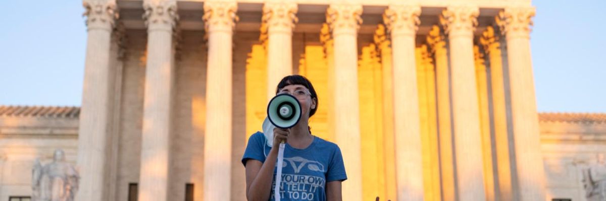 A woman speaks in support of abortion rights