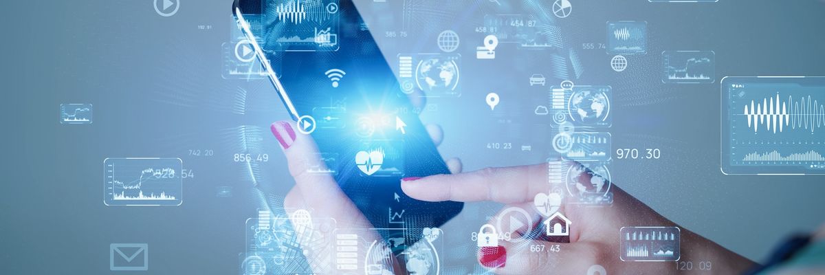 A woman uses a smartphone.