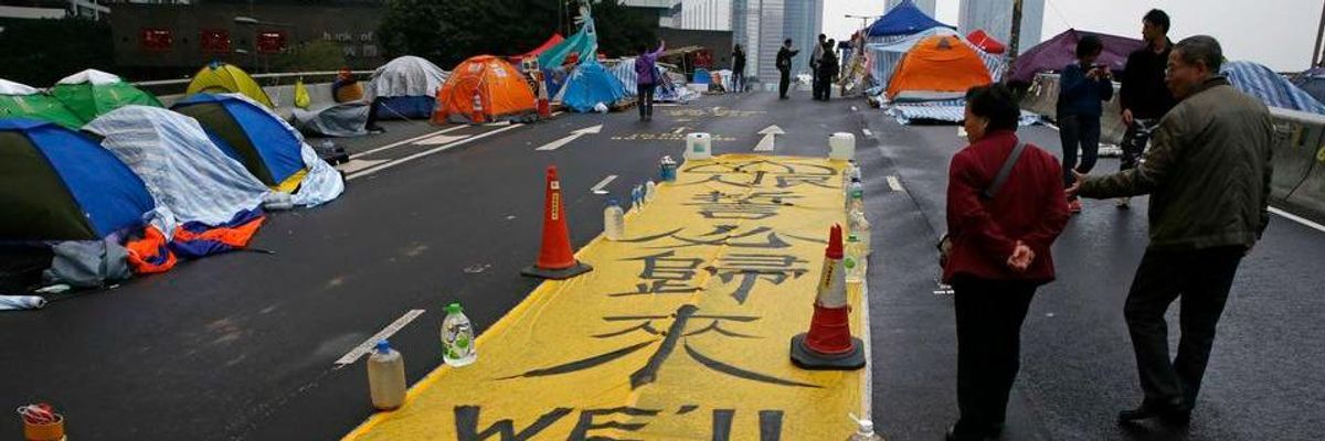 Vows of 'We'll Be Back' As Police Clear Hong Kong Protest Camp