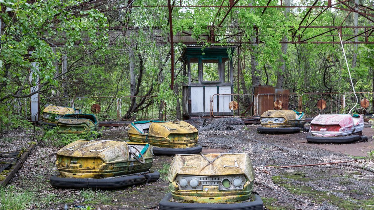 Abandoned bumper cars full of rust sit in an amusement park in the ghost city of Pripyat, Ukraine, which was evacuated on the afternoon of April 27, 1986, 36 hours after the Chernobyl Nuclear Power Plant disaster.