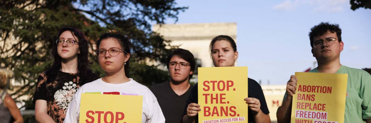 Abortion rights activists gather at the Monroe County Courthouse in Bloomington, Indiana