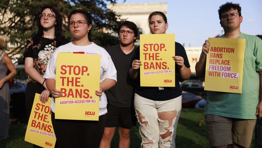 Abortion rights activists gather at the Monroe County Courthouse in Bloomington, Indiana