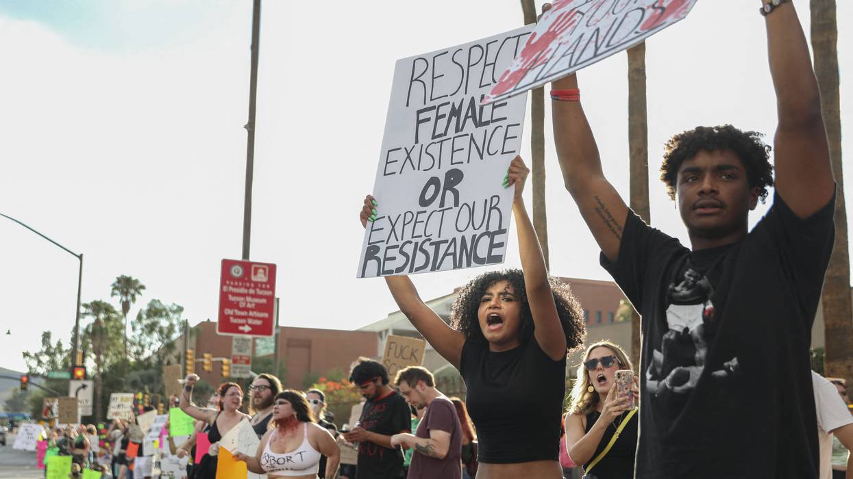Abortion rights activists protest during a rally