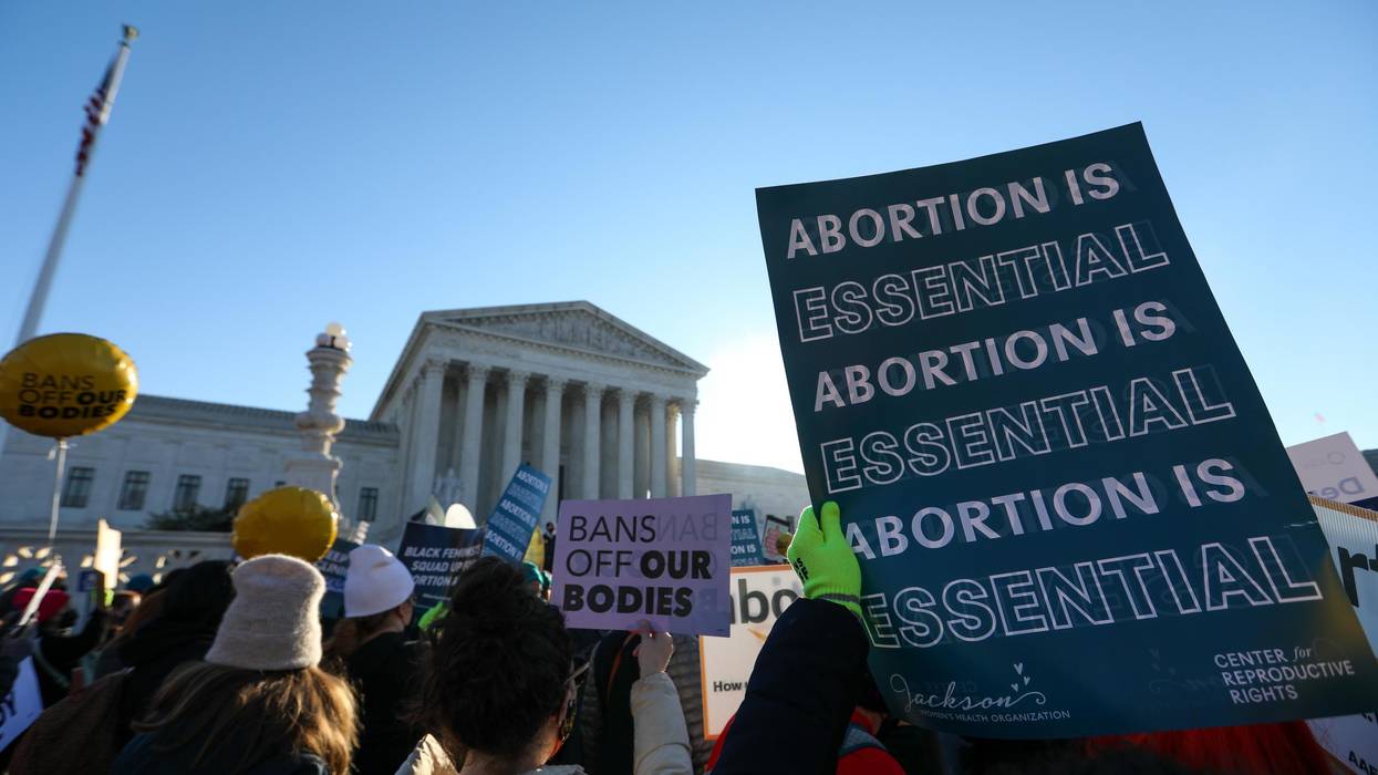 Abortion rights advocates demonstrate in front of the Supreme Court