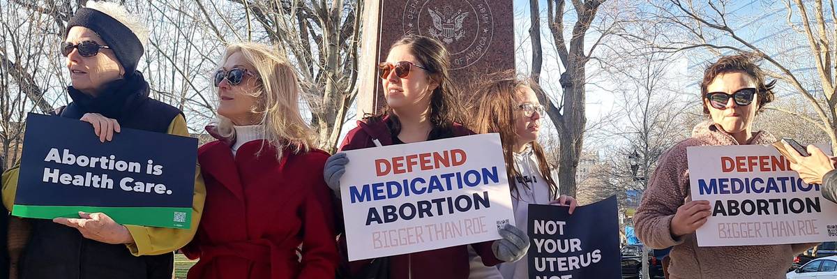 Abortion rights advocates gather in front of a courthouse in Amarillo, Texas.