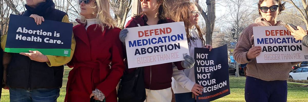 Abortion rights advocates gather in front of a courthouse in Amarillo, Texas.