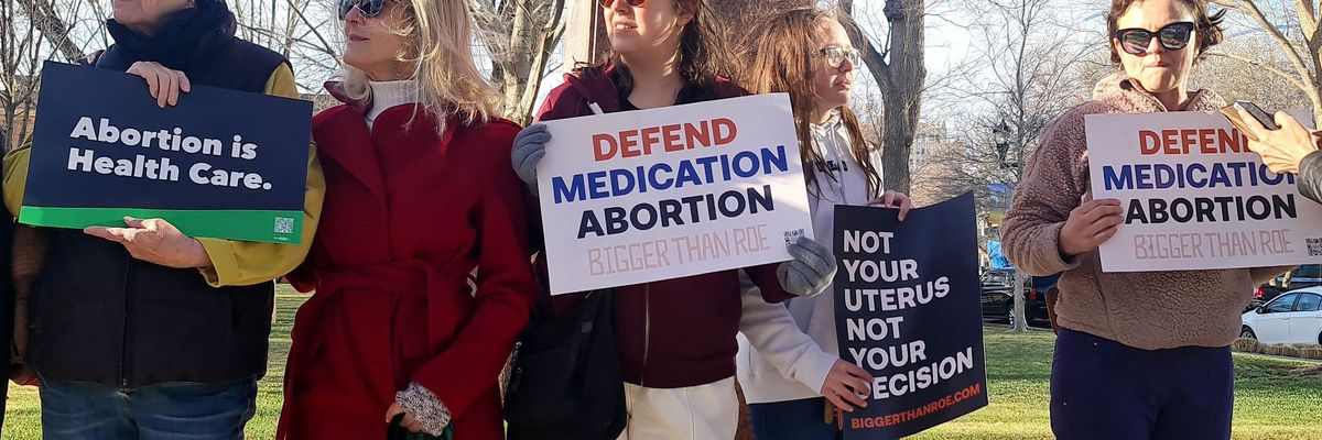 Abortion rights advocates gather in front of a courthouse in Amarillo, Texas.
