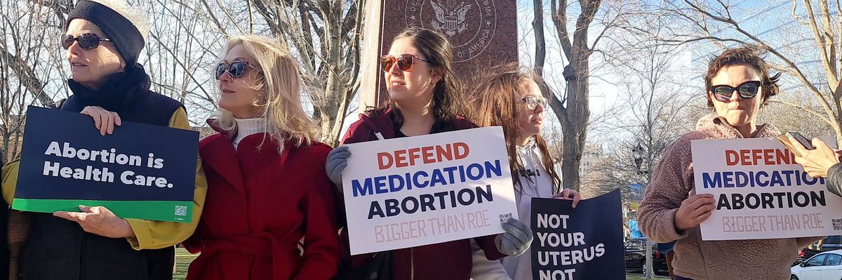 Abortion rights advocates gather in front of a courthouse in Amarillo, Texas.