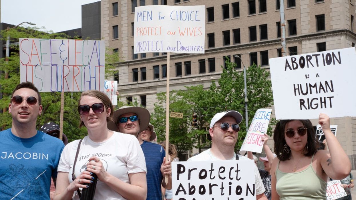 Abortion rights defenders attend a rally in Dayton, Ohio
