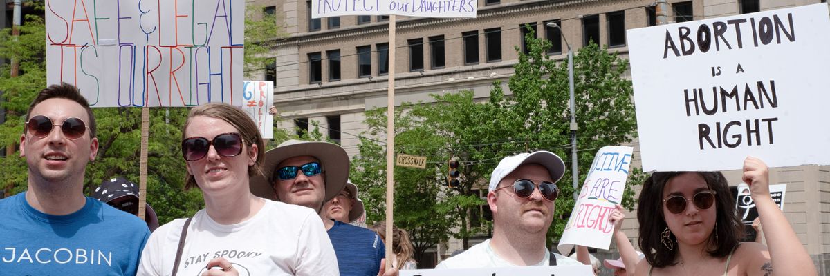 Abortion rights defenders attend a rally in Dayton, Ohio