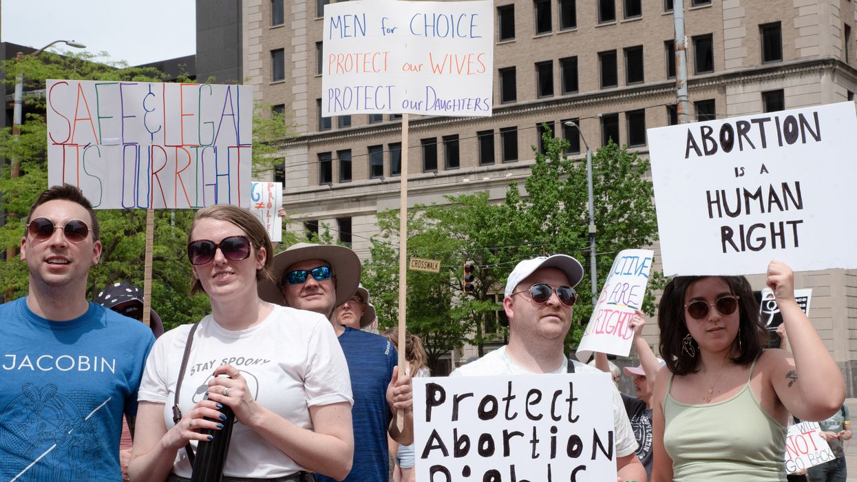 Abortion rights defenders attend a rally in Dayton, Ohio