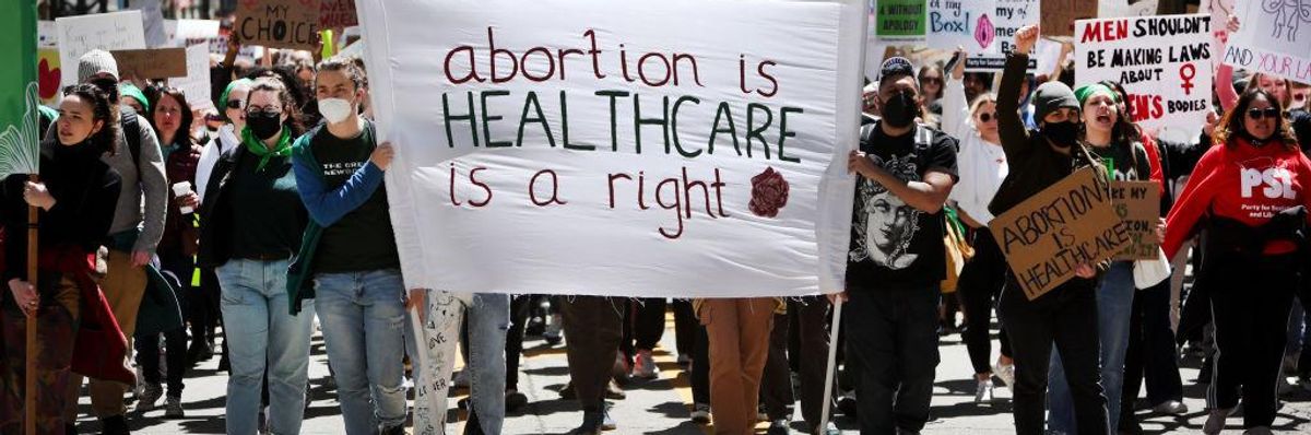 Abortion rights demonstrators march in Chicago