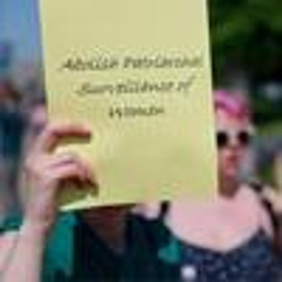 Abortion rights protest, sign readig