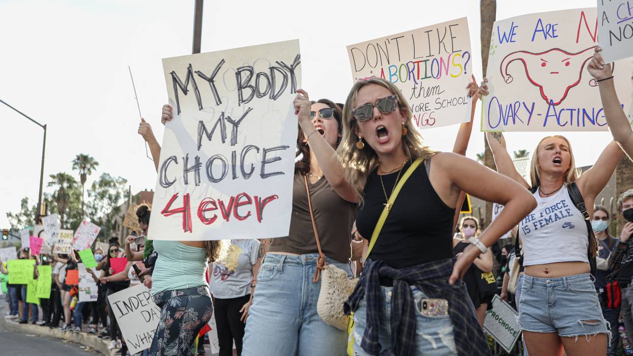 Abortion rights protesters chant during a pro-choice rally