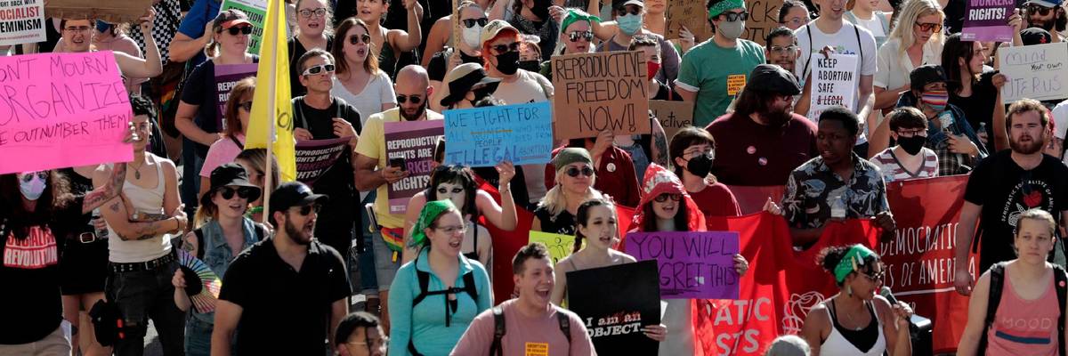 Abortion rights protesters march in Michigan