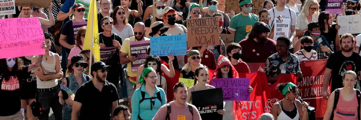 Abortion rights protesters march in Michigan