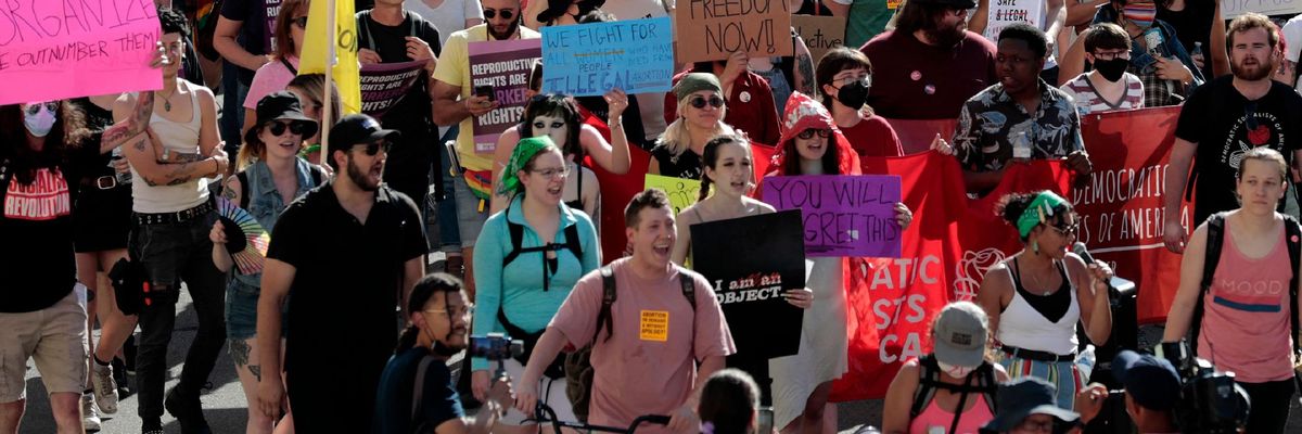 Abortion rights protesters march in Michigan