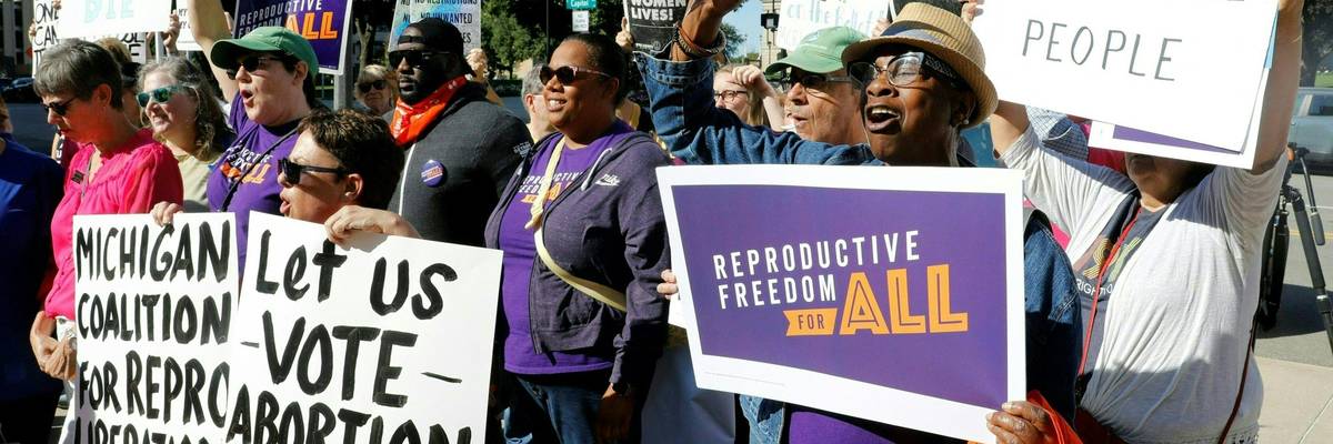 Abortion rights supporters gather outside the Michigan State Capitol