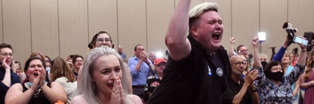 Abortion rights supporters react to the failure of an anti-choice state constitutional amendment