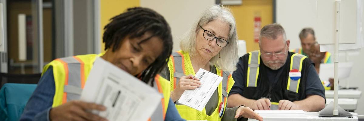 Absentee ballots are prepared to be mailed at the Wake County Board of Elections