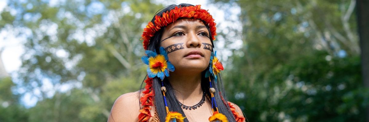 Activist Beka Saw Munduruku against trees.