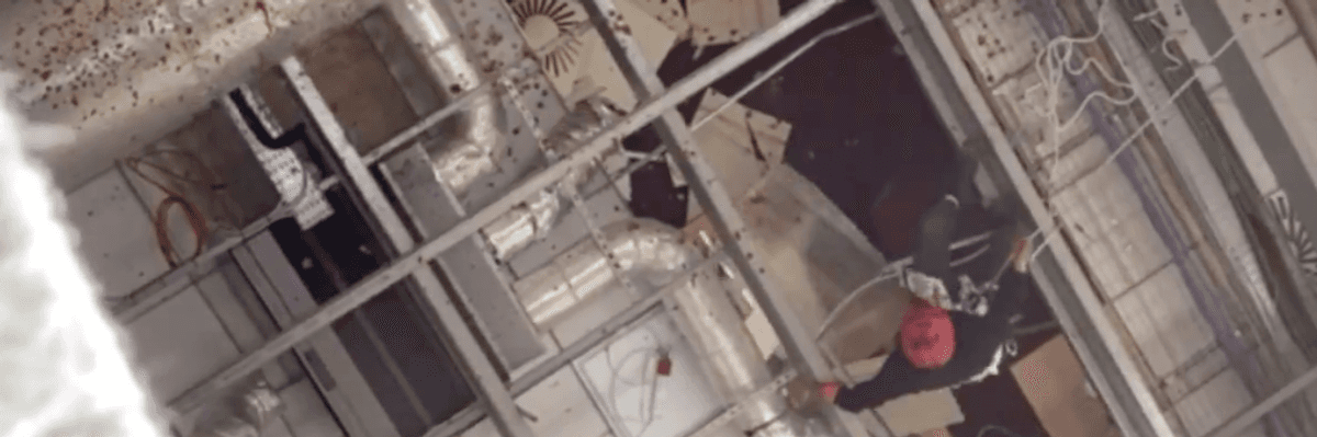 activist with People Against Genocide at Elbit