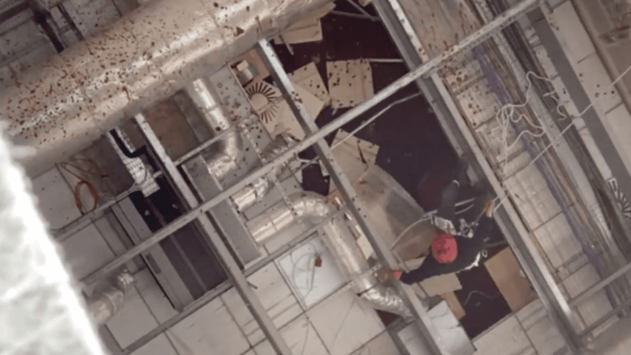 activist with People Against Genocide at Elbit