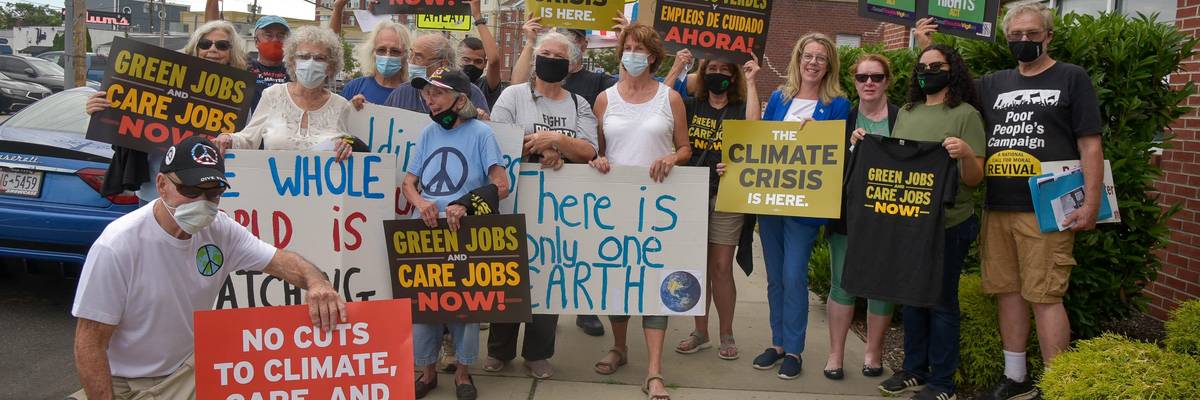 Activists attend the Rally to #SealTheDeal for Climate, Jobs, Care, and Justice on August 19, 2021 in Patchogue, New York