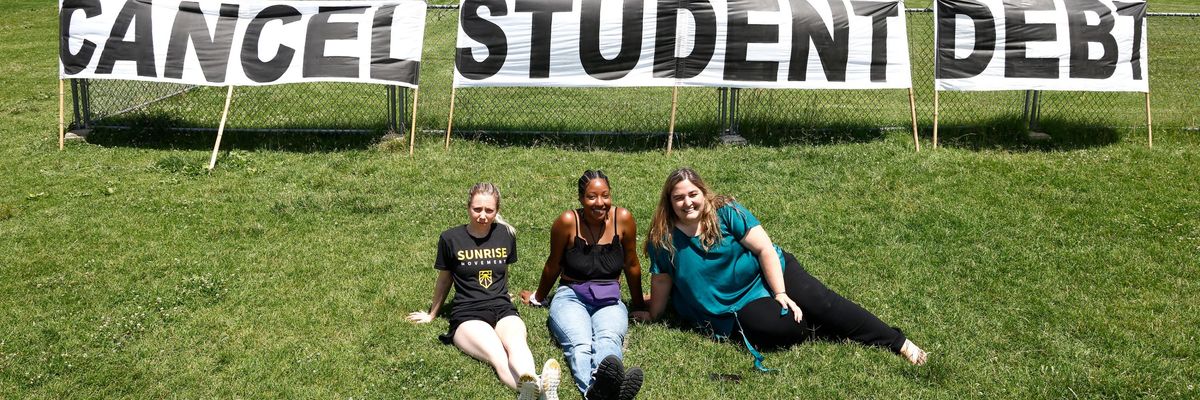 Activists call on President Joe Biden to cancel student loan debt.