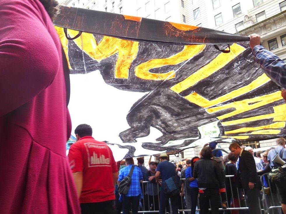 Activists carried banners during the People's Climate March on September 21, 2014. (Photo: Meaghan LaSala/Creative Commons)