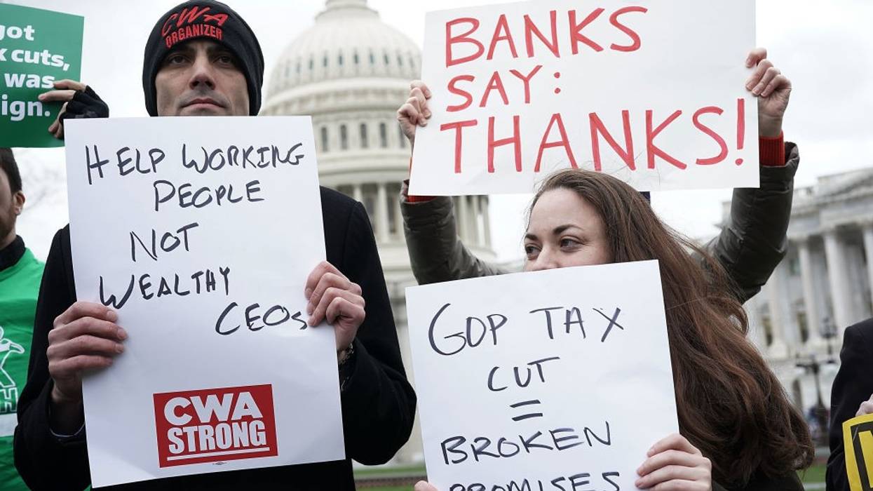Activists demand Congress repeal the Tax Cuts and Jobs Act