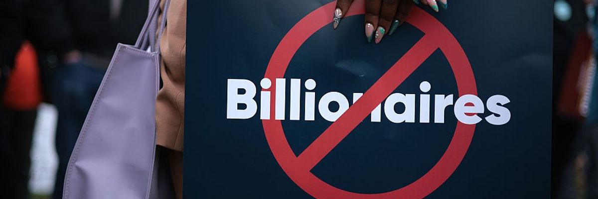 Activists Demonstrate Against Tax Breaks For The Rich And Corporations