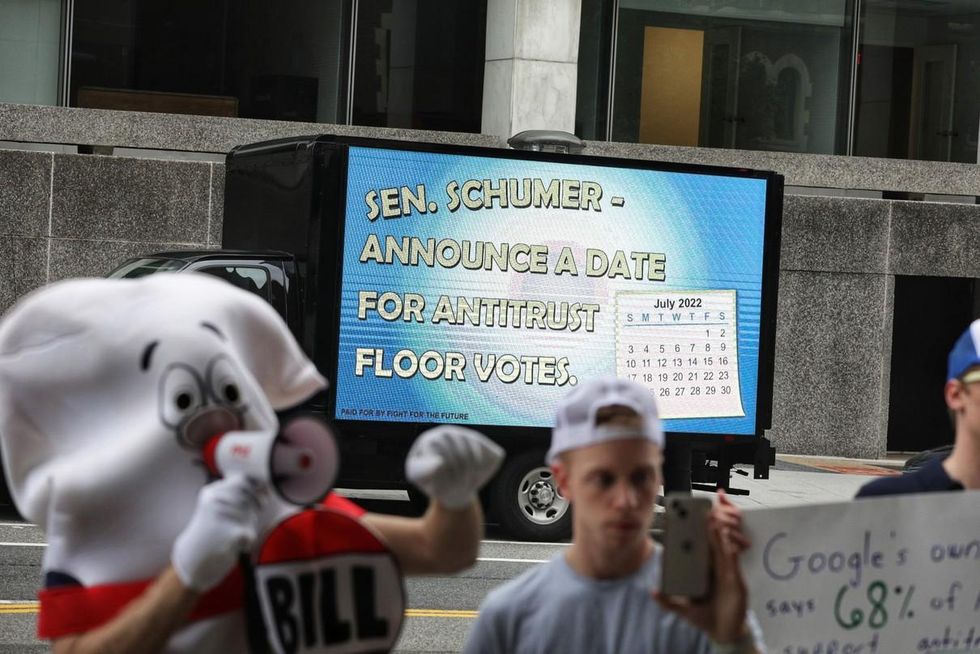 Activists demonstrate in Washington, D.C. on July 26, 2022 to urge Senate Majority Leader Chuck Schumer (D-N.Y.) to hold votes on antitrust legislation targeting Big Tech. (Photo: Demand Progress)