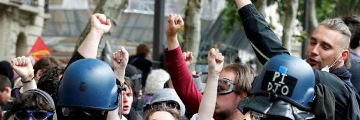 Chaos Erupts in Paris as Riot Police Unleash on 50,000-Strong Labor Protest