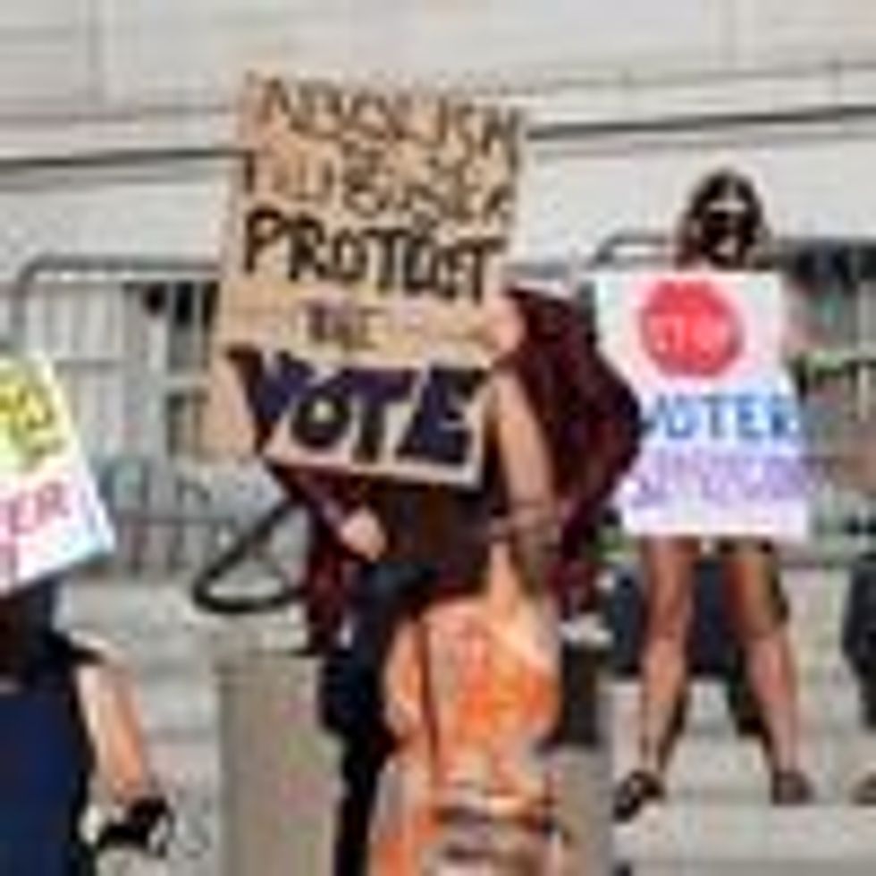 Activists from various grassroots organizations rally outside City Hall in Los Angeles on July 7, 2021, calling on Sen. Dianne Feinstein (D-Calif.) and other senators to remove the filibuster and pass the