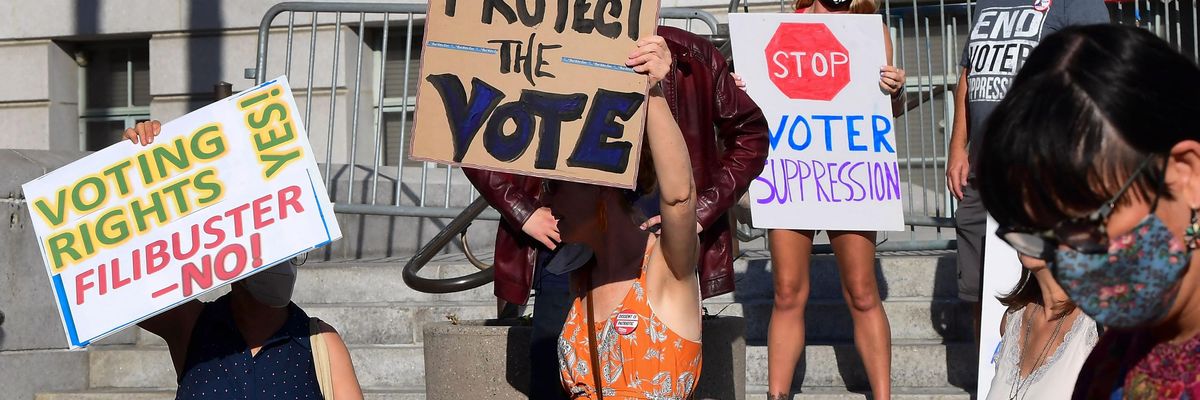 Activists from various grassroots organizations rally outside City Hall in Los Angeles on July 7, 2021, calling on Sen. Dianne Feinstein (D-Calif.) and other senators to remove the filibuster and pass the "For the People Act" to expand voting rights. (Photo: Frederic J. Brown/AFP via Getty Images)