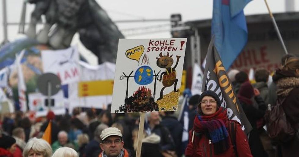 Activists hold placards and shout slogans against the energy policy of the German government during an anti coal Protest on December 1, 2018 in Berlin, Germany. Protests are taking place today in Berlin and Cologne ahead of the United Nations COP 24 climate conference that will begin tomorrow in Katowice, Poland. (Photo: Michele Tantussi/Getty Images)