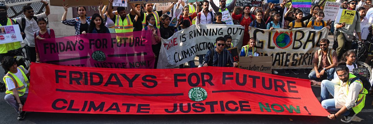 Activists hold placards during a "'Global Climate Strike'' organized by the Fridays for Future movement in New Delhi, India on March 3, 2023. 