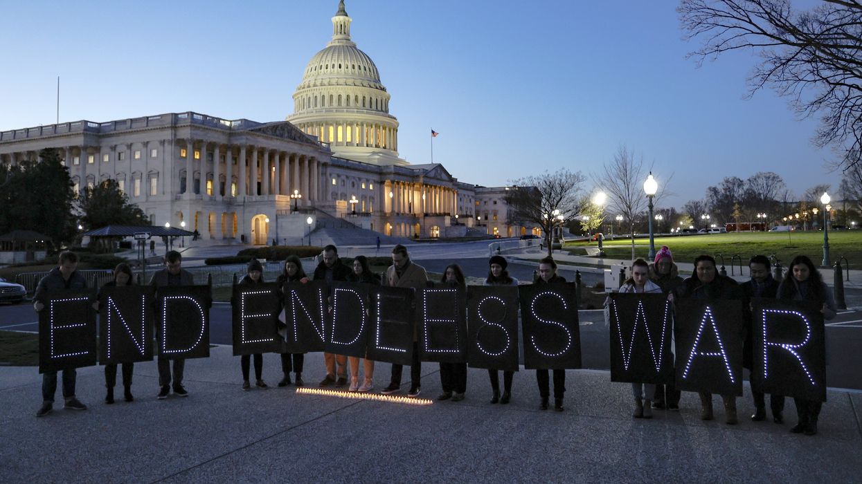 Activists hold up panels spelling out "End Endless War" during a demonstration outside of the U.S. Capitol building to commemorate the 20th anniversary of the Iraq War on March 15, 2023. 
