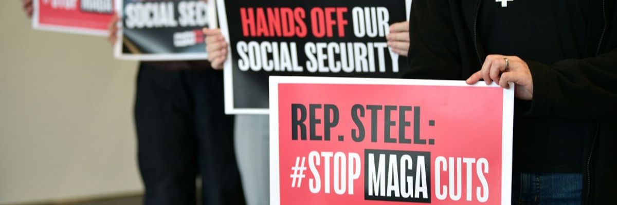 Activists holding signs opposing Social Security cuts