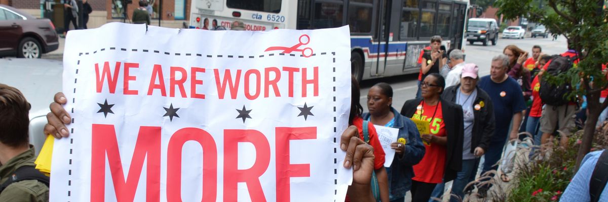 Activists march for a higher minimum wage