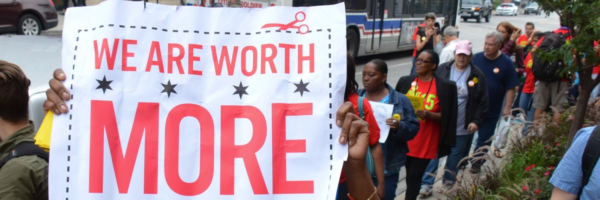 Activists march for a higher minimum wage