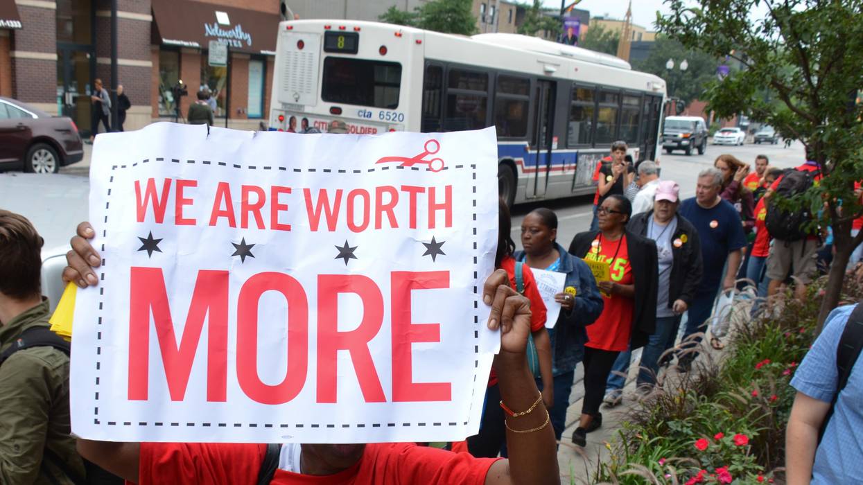 Activists march for a higher minimum wage