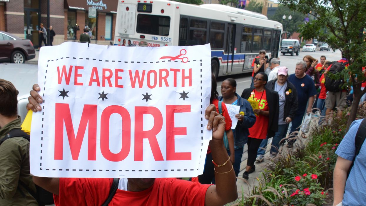Activists march for a higher minimum wage