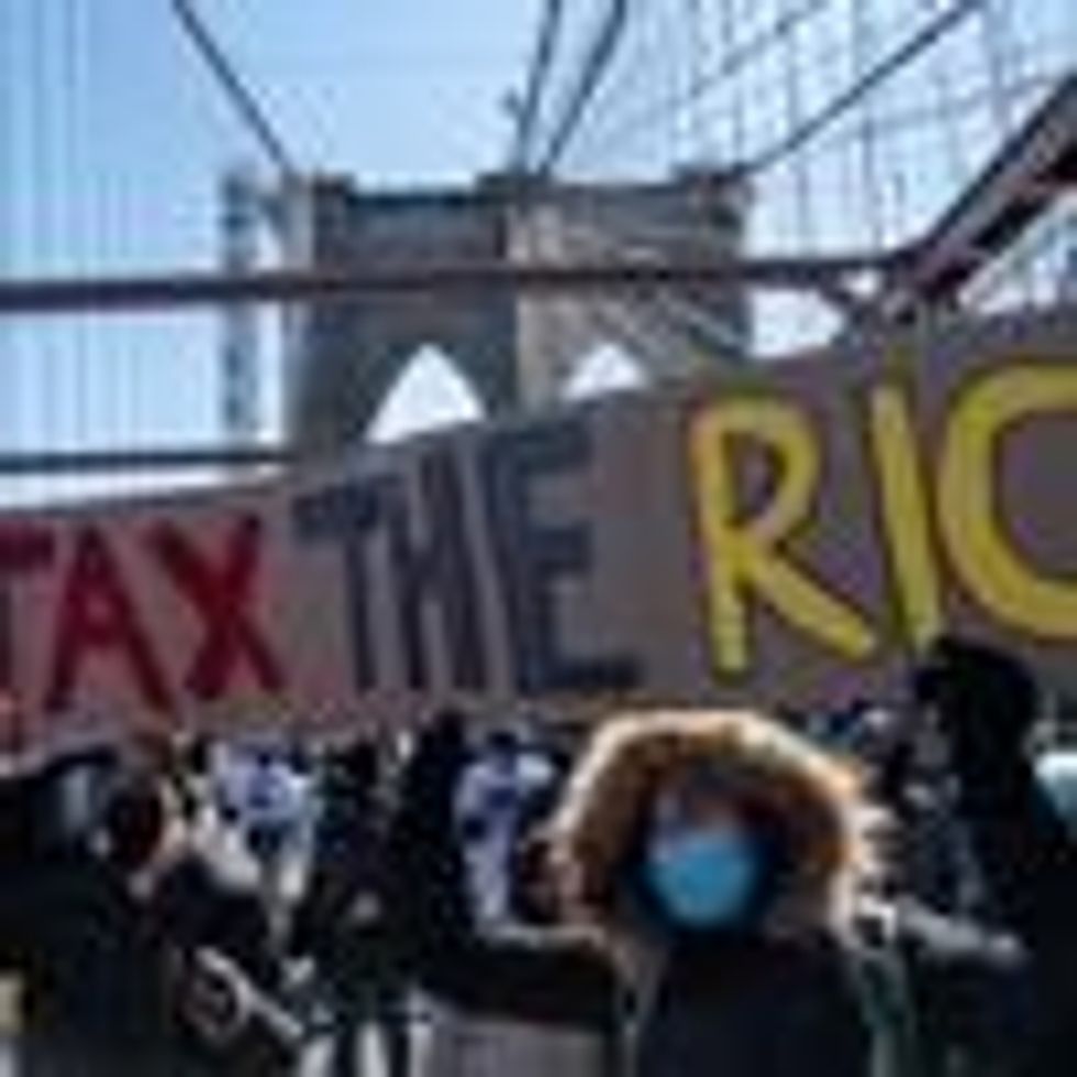 Activists march with a