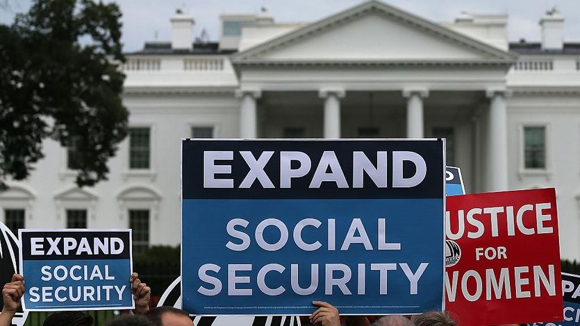 Activists participate in a rally urging the expansion of Social Security benefits in front of the White House on July 13, 2015 in Washington, D.C.