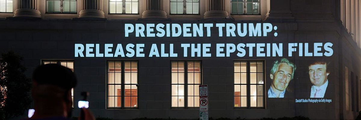 Activists Project Message To Trump Calling For Release Of Epstein Files