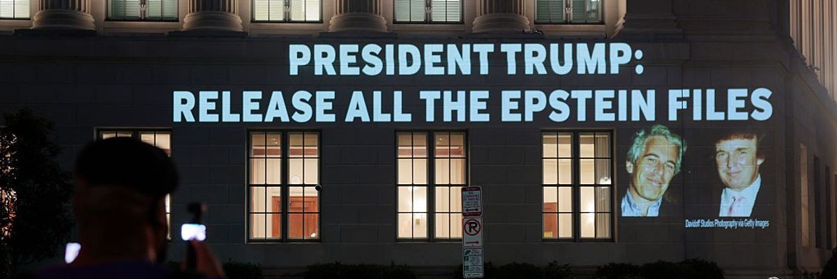 Activists Project Message To Trump Calling For Release Of Epstein Files
