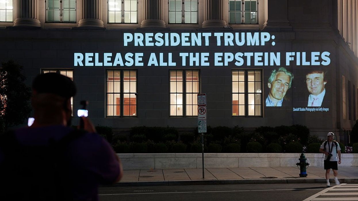 Activists Project Message To Trump Calling For Release Of Epstein Files